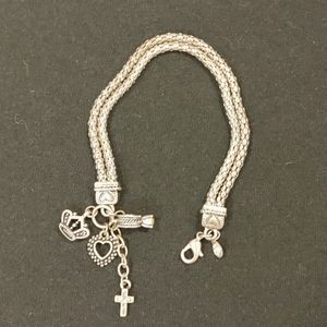 Braided silver bracelet with charms
